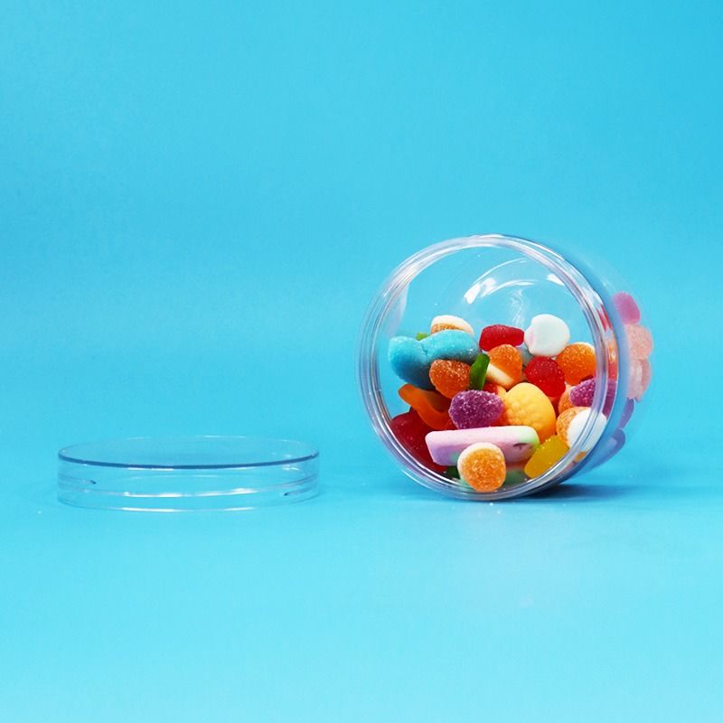 透明なPETプラスチック 乾燥食品 キャンディ クッキー ナッツ ギフトボトル スクロール フラット 蓋 食品級