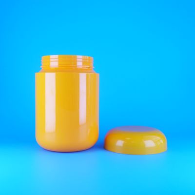 丸い形の食品グレードオレンジプラスチックPETスクリューフラットオレンジキャップクッキーキャンディージャー